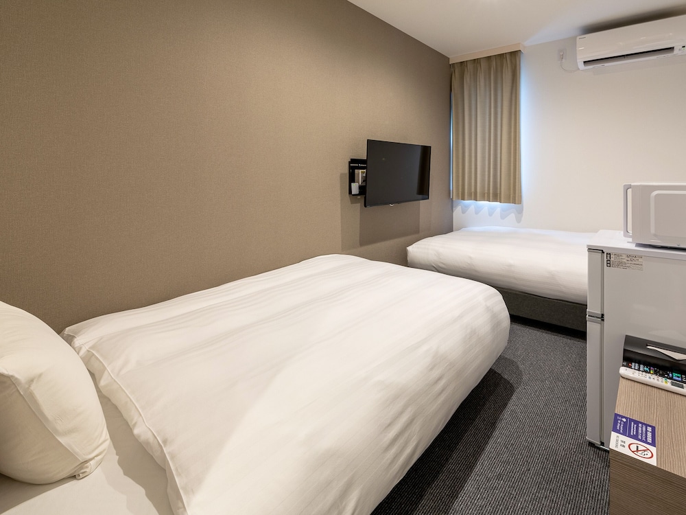 スタンダード ツインルーム (23時以降のチェックインはできませんのでご注意ください) | HOTEL R9 The Yard 鹿屋