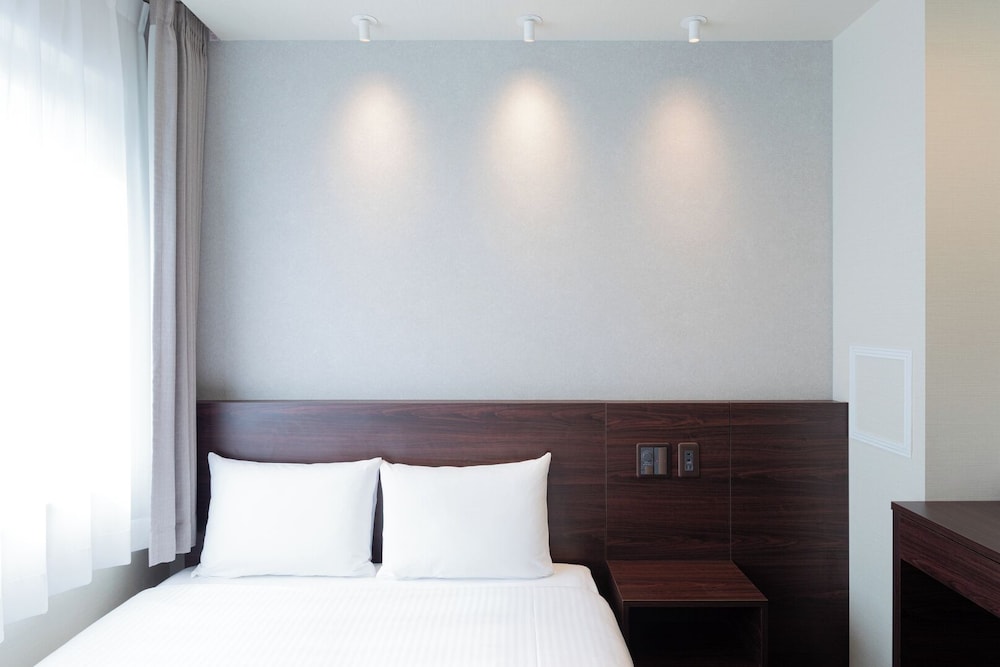 ダブルルーム 客室1 | ファーイーストビレッジホテル大阪本町