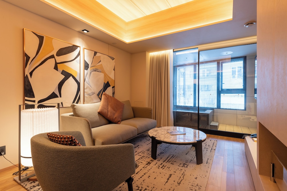 1 ベッドルーム レジデンス 温泉付き リビング エリア1 | ニセコ郷