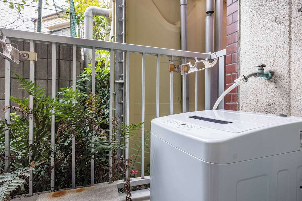 Esterrace 103 禁煙 ランドリー1 | エステラス大阪ウエスト