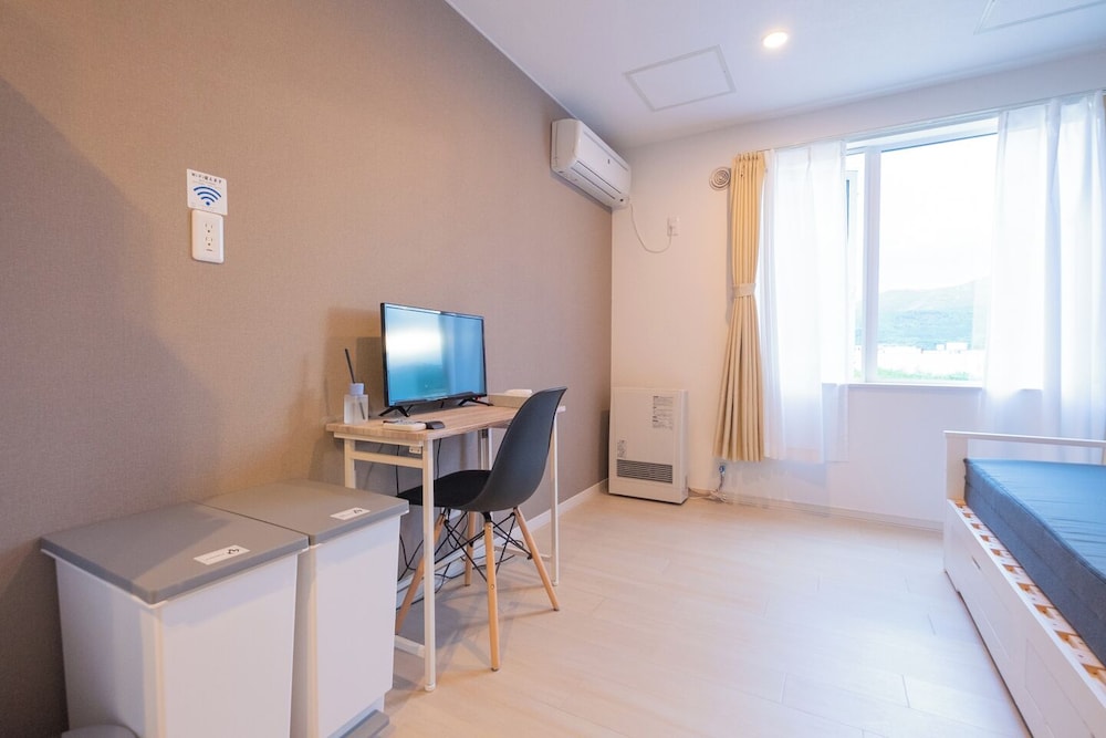 スタンダード ダブルルーム リビング エリア6 | Niseko Hirafu Ski Resort Condo