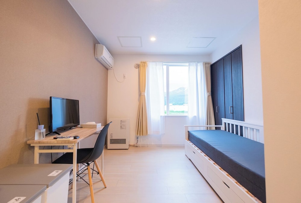 スタンダード ダブルルーム リビング エリア8 | Niseko Hirafu Ski Resort Condo