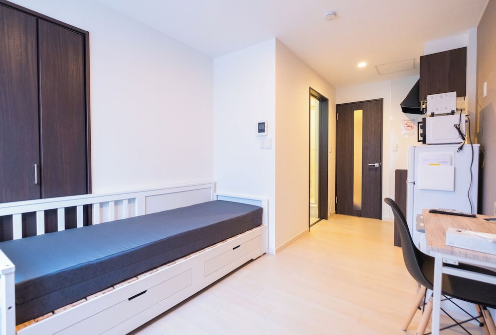 スタンダード ダブルルーム リビング エリア2 | Niseko Hirafu Ski Resort Condo