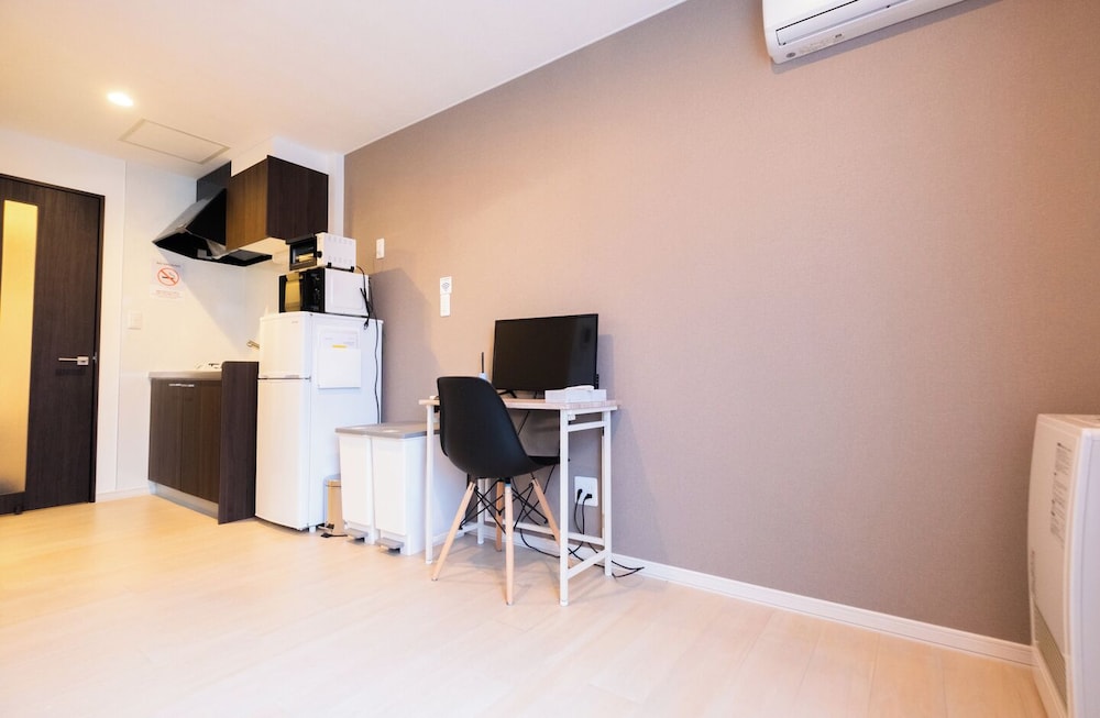 スタンダード ダブルルーム リビング エリア1 | Niseko Hirafu Ski Resort Condo