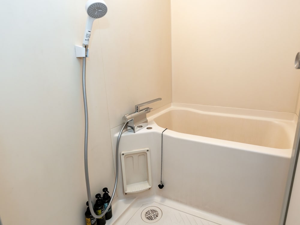 デラックス和室ツイン10畳 禁煙 バスルーム0 | 亀の井ホテル 草津湯畑