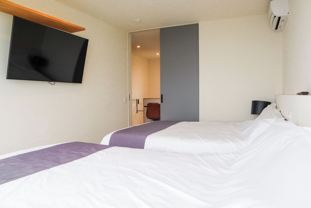 スタンダード ヴィラ 2 ベッドルーム ペット不可 客室2 | ヴィラミクリ角島