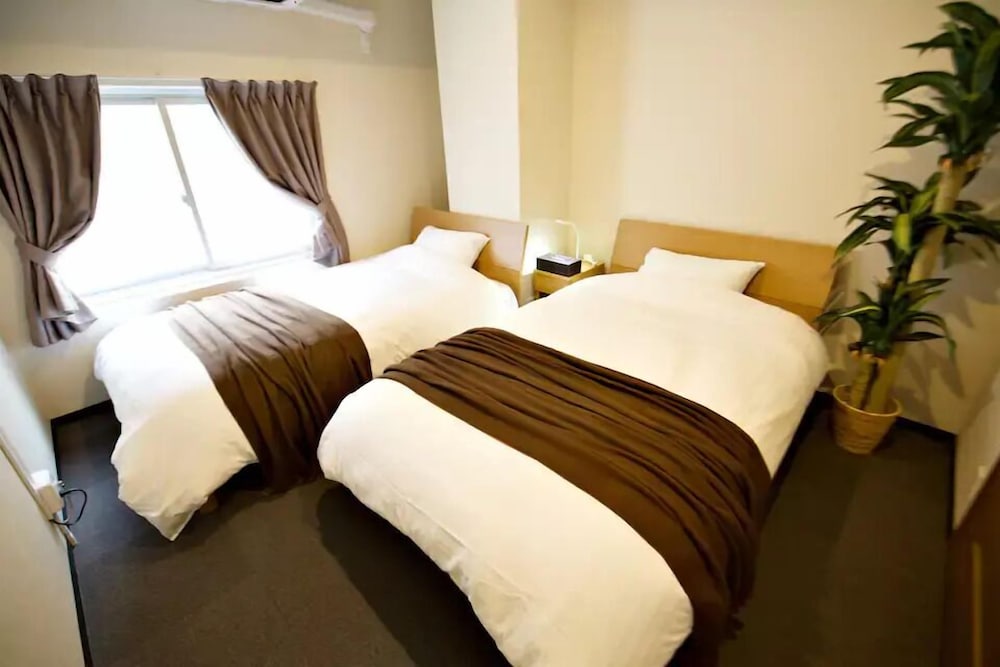 ベーシック アパートメント 客室1 | KURA HOTEL IZUMISANO