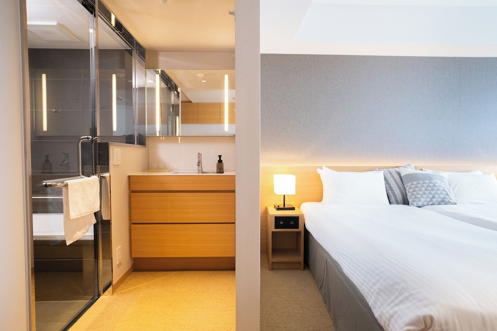 デラックス スイート シングルベッド 3 台 禁煙 (Residence) 客室2 | KABIN Taka