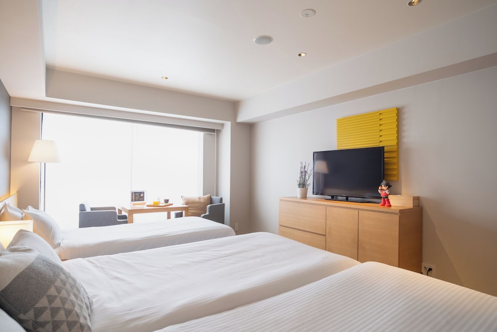 デラックス スイート シングルベッド 3 台 禁煙 (Residence) エキストラベッド0 | KABIN Taka