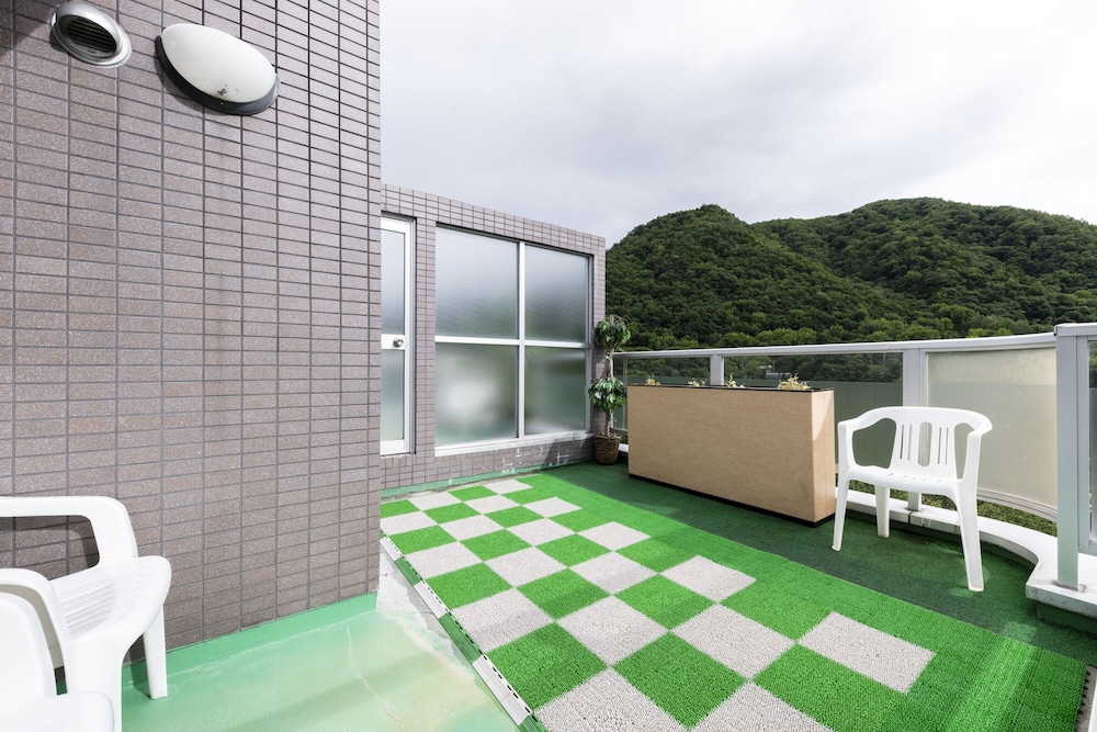 ビジネス アパートメント テラス / パティオ1 | Few Days Condominium 205